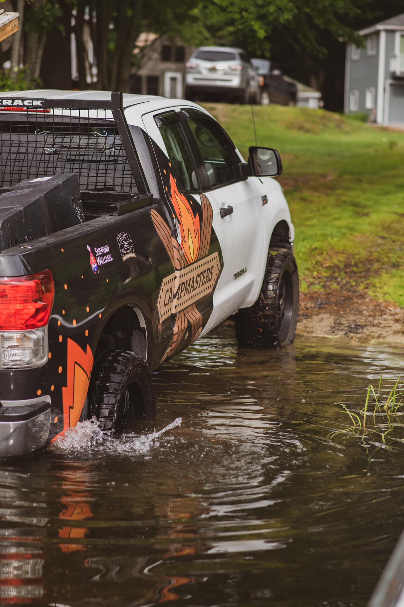 image of campmasters maine truck pulling out of the water from installing a dock